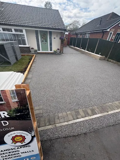 Resin bound driveway being installed on a Manchester property